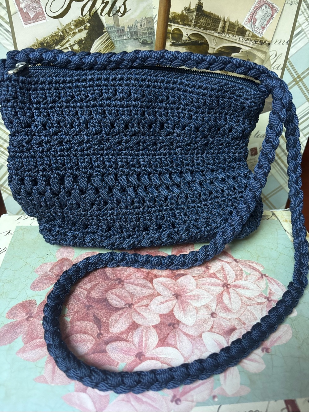 dark blue crochet or knit crossbody shoulder bag